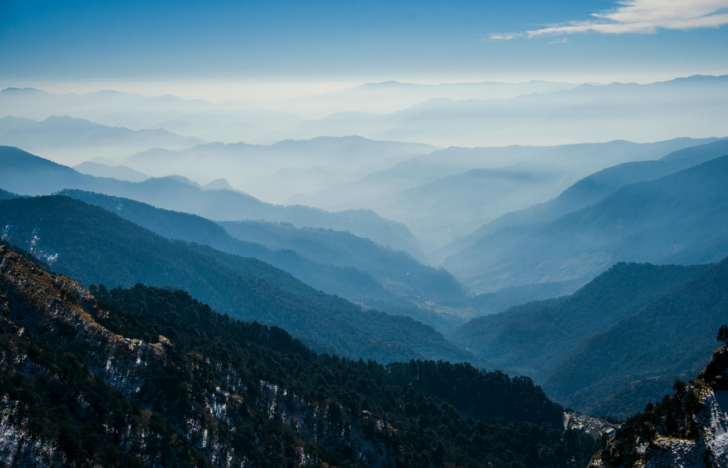 Hazy sky over a distant mountain range
