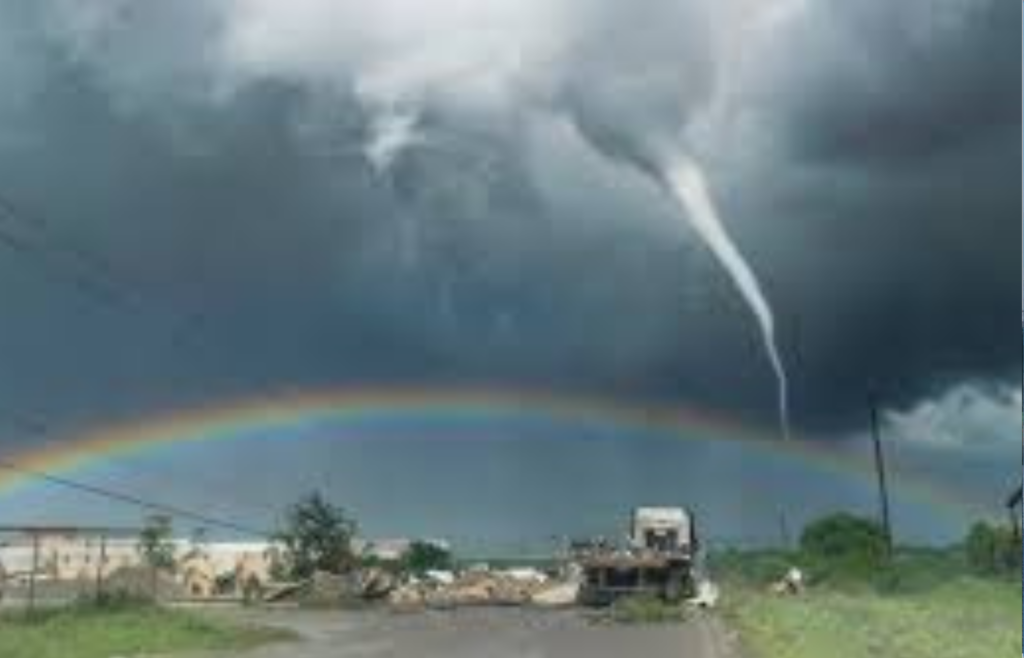 A small tornado with fiery and rainbow-like hues swirling inside it.