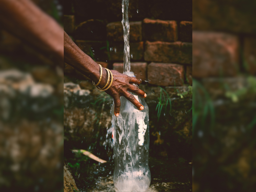catching water on a bottle