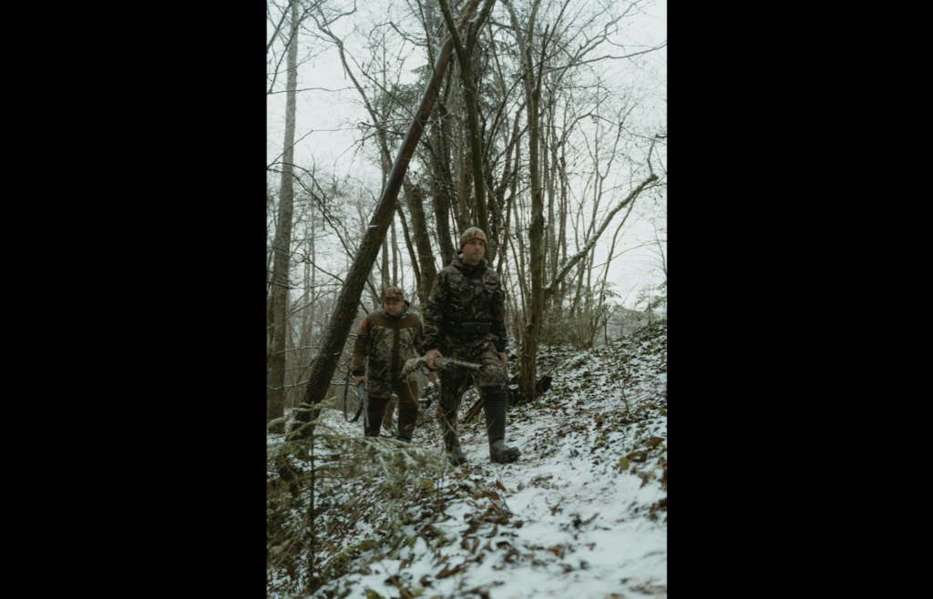 Soldiers walking on snow-covered ground