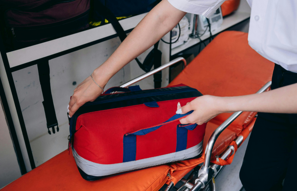 Woman holding bag on stretcher