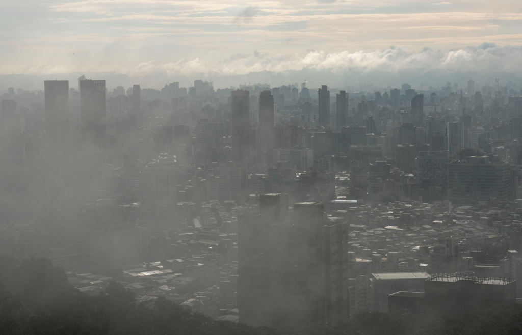 A city is covered in fog and smoke