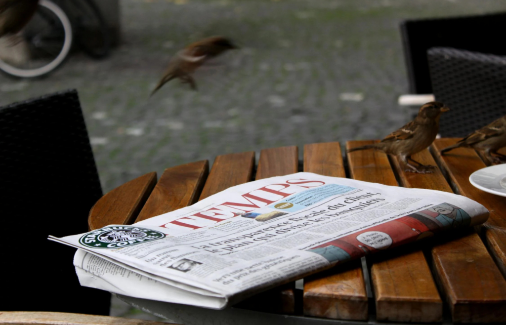 Newspaper on a wooden table