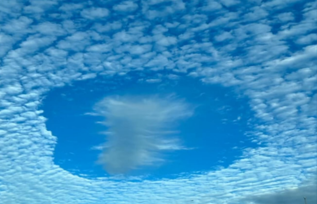 Circular hole in a cloud layer