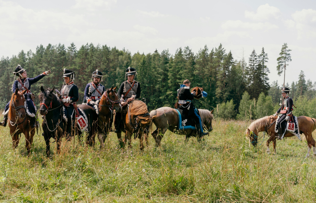 Soldiers ridding brown horses