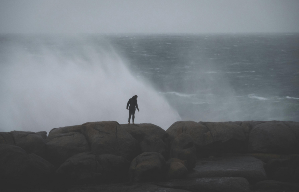 A person sniffing the air with an approaching storm