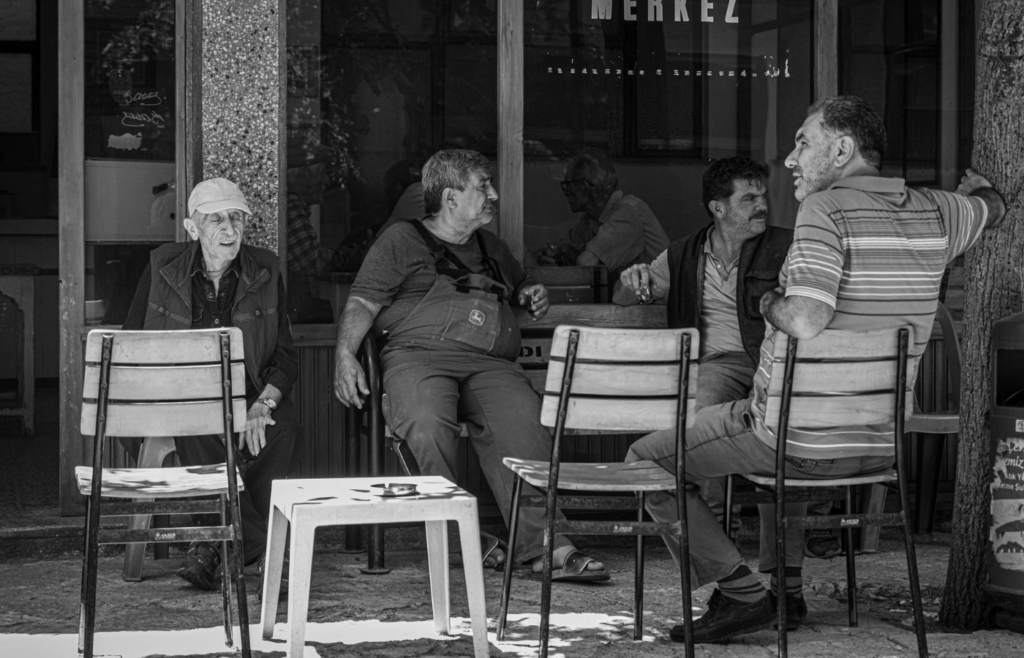 A group of neighbors having a discussion outdoors