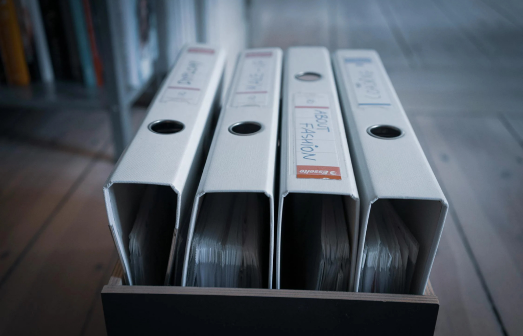 A neatly arranged folder labeled Important Documents on a desk