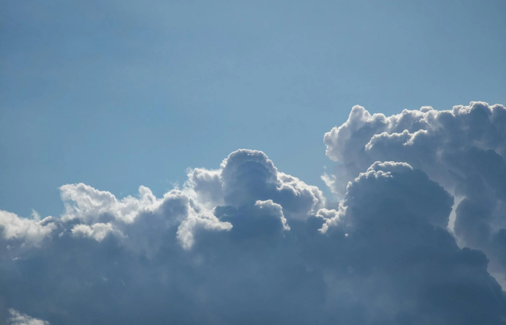Pyrocumulus clouds rising above a wildfire
