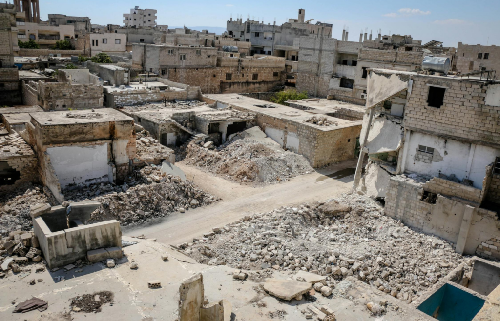 Tilted buildings and cracked ground post-earthquake