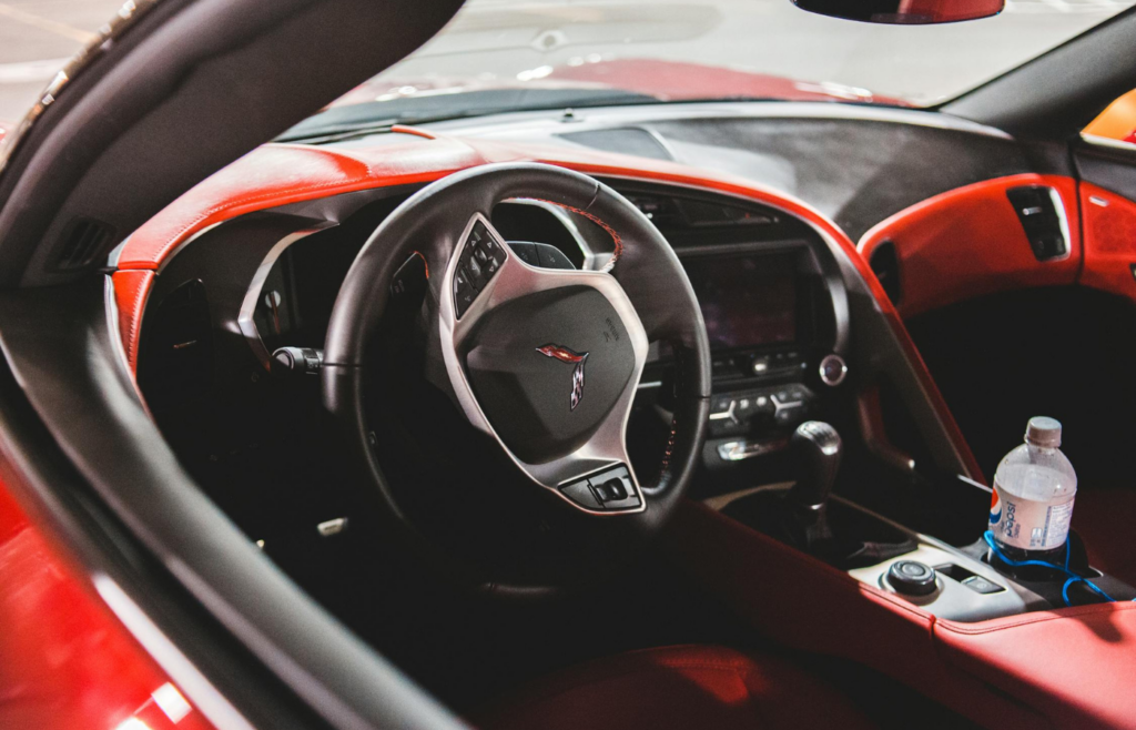 Bottled water and energy bars stored in a car compartment