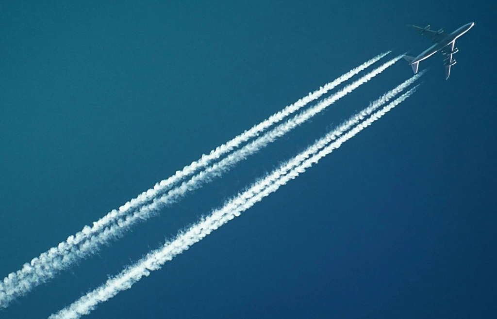 Airplane contrails lingering in the sky