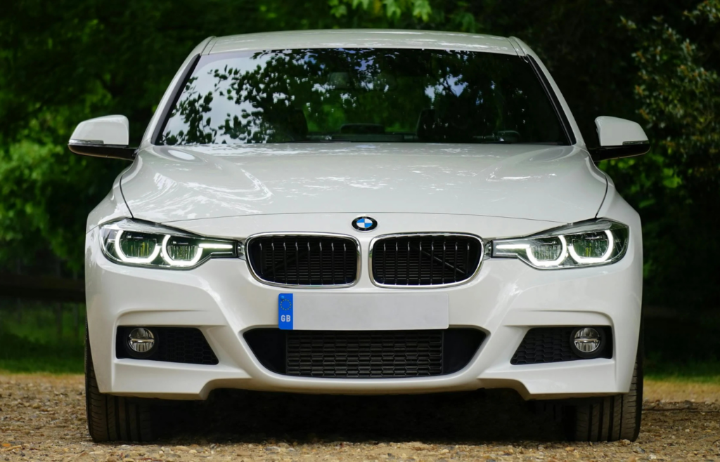 Car with removed bumper stickers and neutral paint