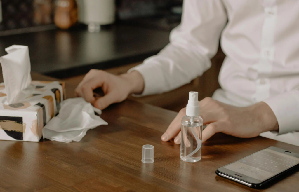  Bottle of hand sanitizer on a kitchen table