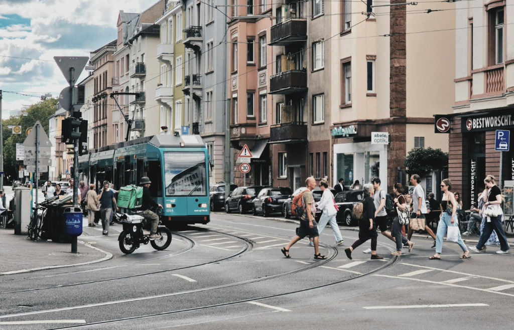 People bracing themselves as buildings sway