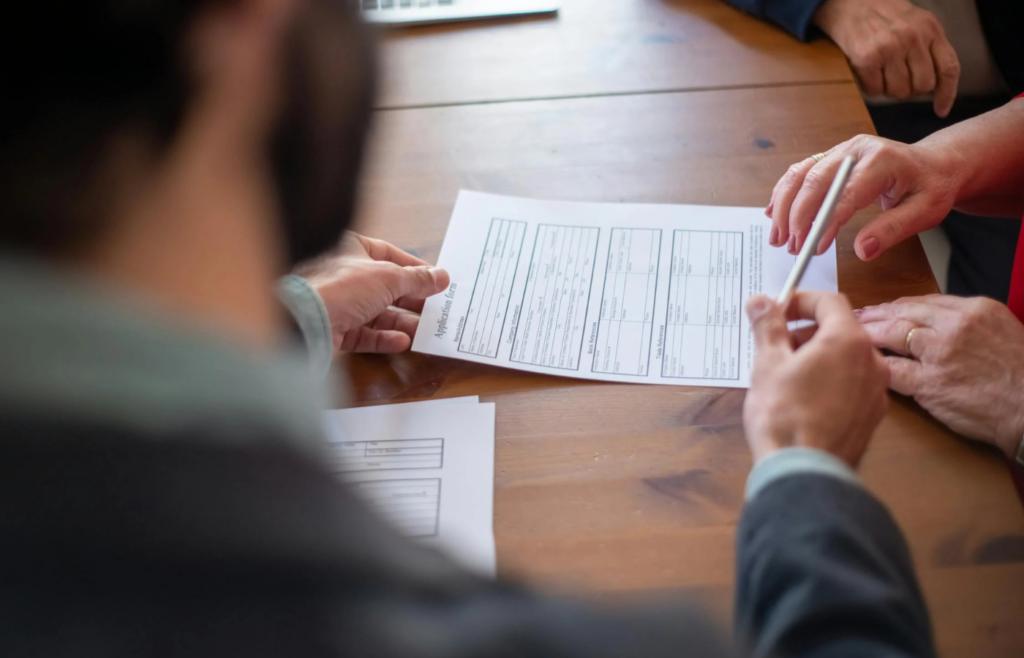 Homeowner reviewing an insurance policy document
