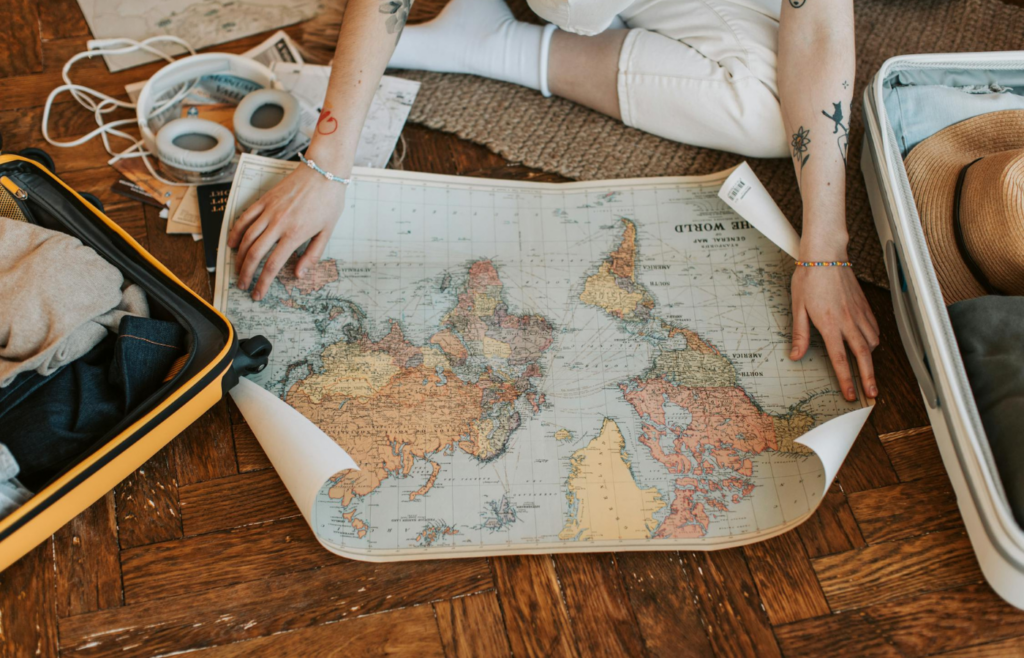 A person examining a detailed map of their area