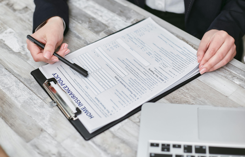A Person Holding a Black Pen