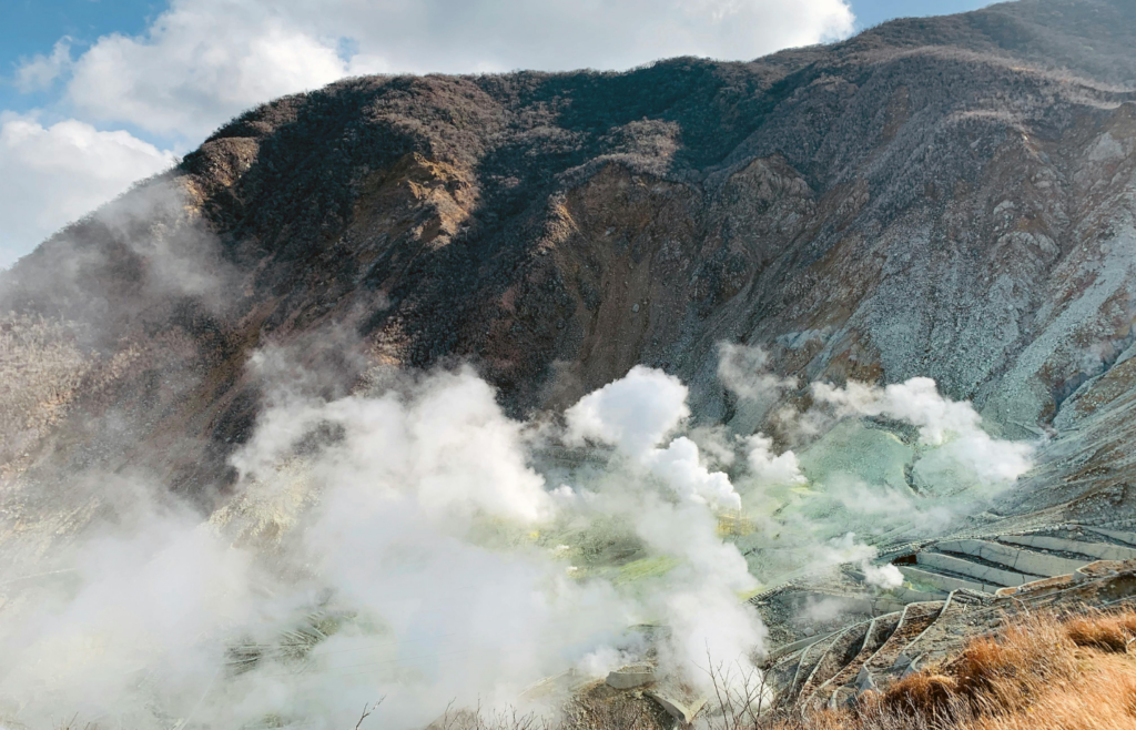 Volcanic terrain with foggy atmosphere