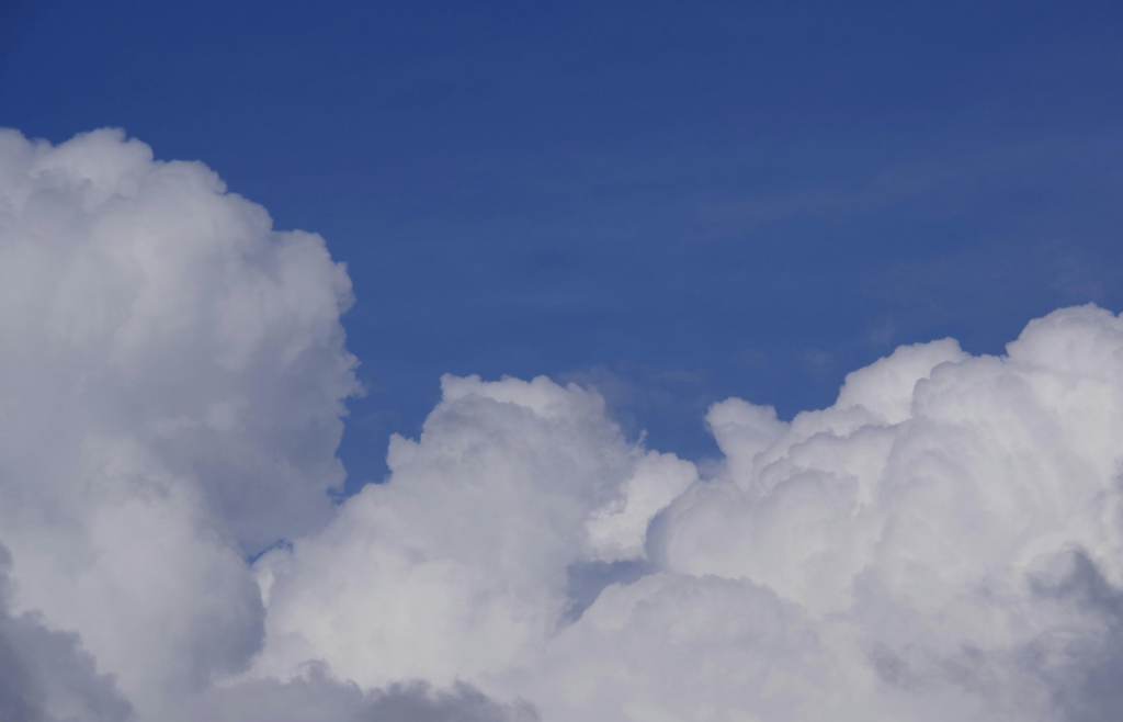 A close-up shot of clouds on the blue sky