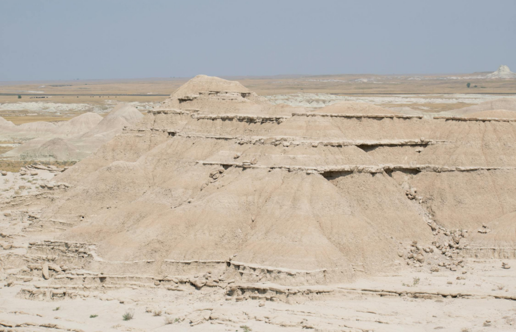Semi-circular earth mounds designed to capture rainwater in arid regions