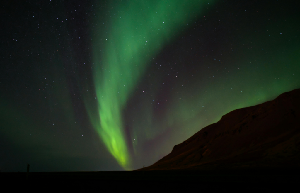 Auroras in sky during night