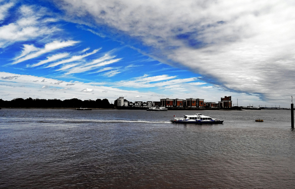 Landscape photography of white boat on sea