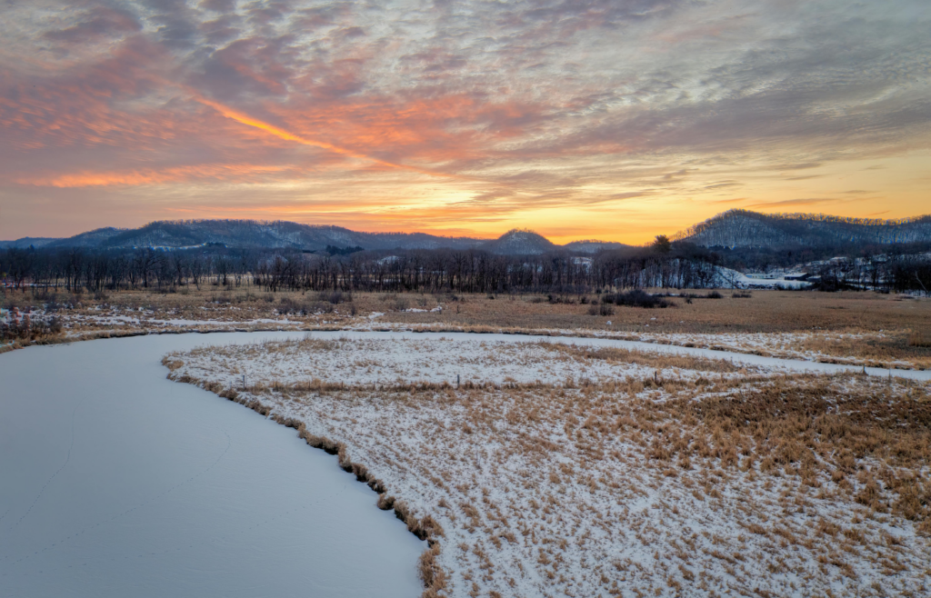 Winter sunset over snowy Wisconsin landscape