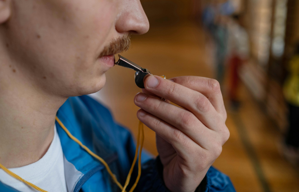 Person Ready to Blow a Whistle