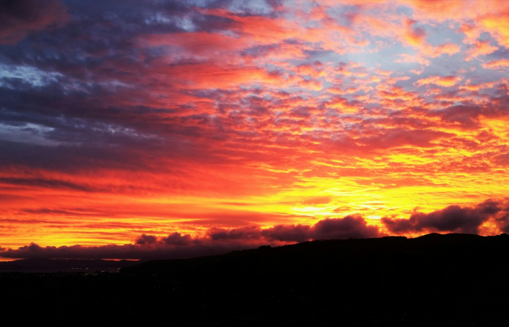Mountains under red skies