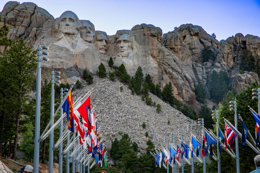 Flags at foot of Mount Rushmore