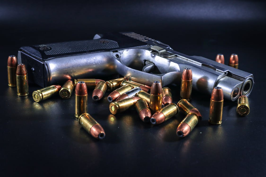 Metal pistol with brass copper bullets