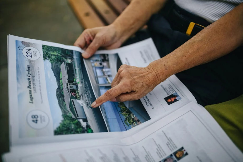 Person holding a magazine