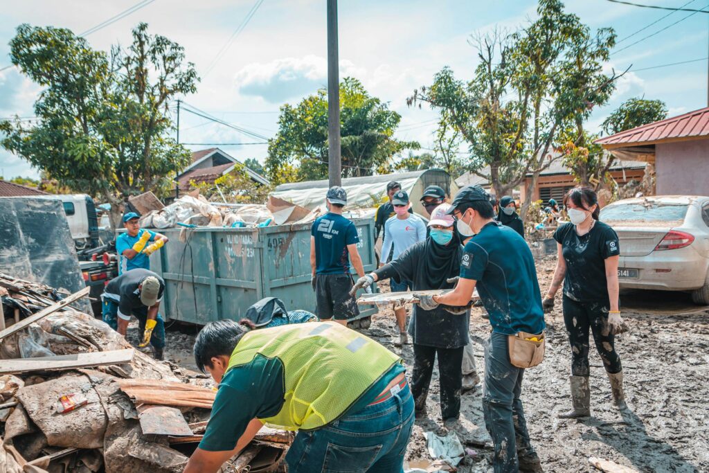 Neighbors working together to clear debris
