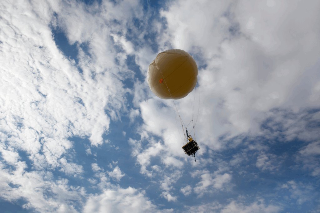 a tethered balloon ascends